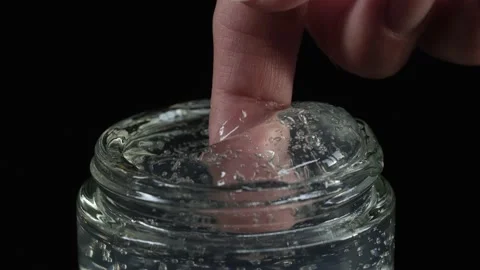 Woman's hand trying cosmetics serum facial fluid gel, hyalurinic acid cream 스톡 동영상 144653351