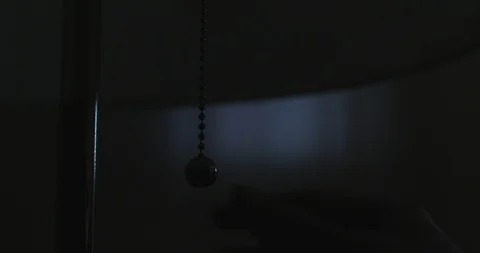 Woman's hand turn on the lamp Video stock 120999563