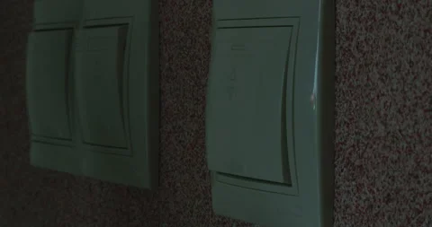 A woman's hand turns on the light. Stock Footage 305643757