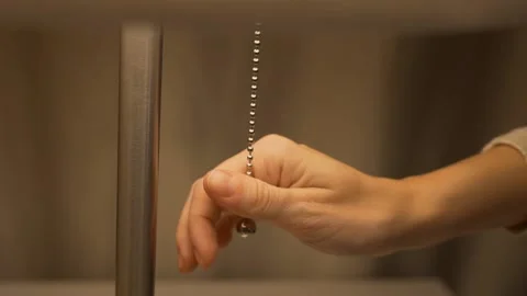 A Woman's Hand Turns Off The Light. The Process of Turning off the Table Lamp in Stock Footage 140971956