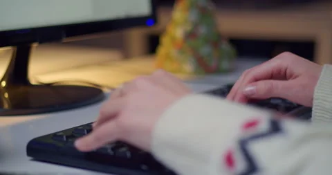 Woman's hand typing on computer keyboard Stock-Footage 144268077