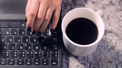 Woman's hand typing on the laptop Stock Footage