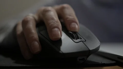 Woman's hand uses computer mouse Video stock 126548135