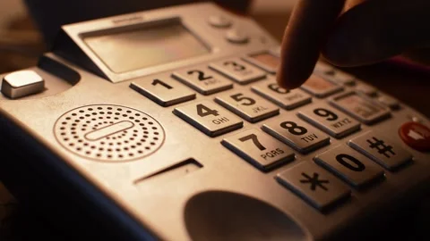 Woman's hand using an old fashioned telephone. vintage telephone dialing. Stock-Footage 219320464