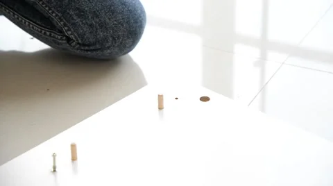 Woman's hand using a screw driver to screw  wood Stock Footage 49387807