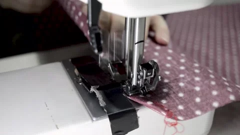 Woman's hand using a sewing machine, close-up view 스톡 동영상 146642786