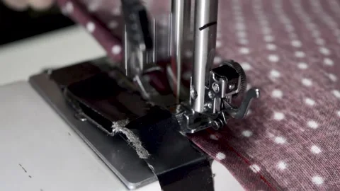 Woman's hand using a sewing machine, close-up view 스톡 동영상 146642789