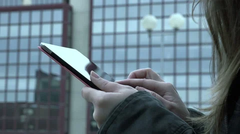 Woman's hand using tablet computer pc outdoor the office: corporate, business Stock-Footage 56238694