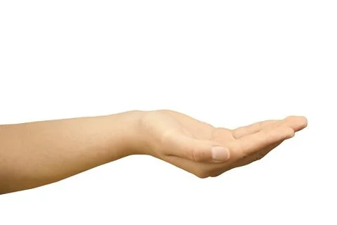 A woman's hand on a white background is stretched palm up, asking for help alms. Stock Photos