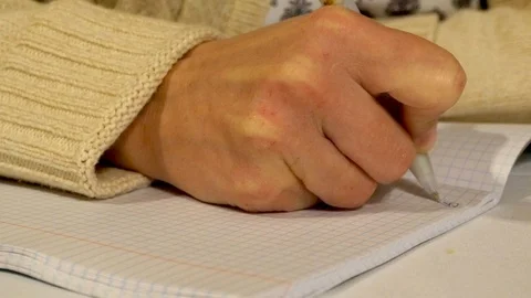 Woman's hand writes with a pen in a notebook 스톡 동영상 104701244
