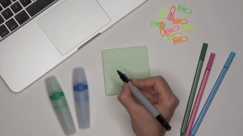 Womans hand writing ART on notepad Stock Footage 101888670