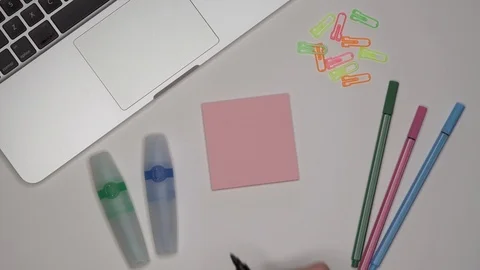 Womans hand writing CLASS on notepad Stock Footage 100113820