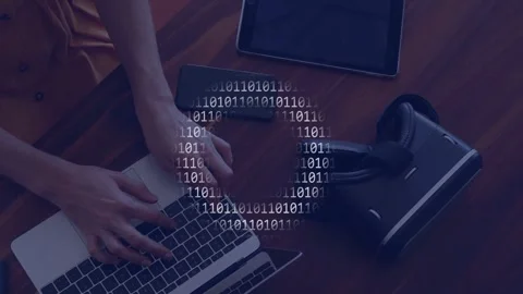 Woman's hands appearing and typing on laptop, working on tech task with binary Stock Footage 335235888
