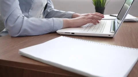 A woman's hands are typing on her laptop. Stock Footage 182019461