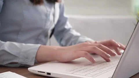 A woman's hands are typing on her laptop. Stock Footage 182027913