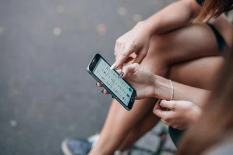 Woman's hands are using smartphone. Stock Photos