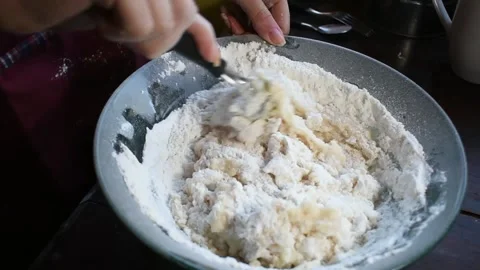 Woman's hands beating a mixture for cooking Vídeos de archivo 151302493