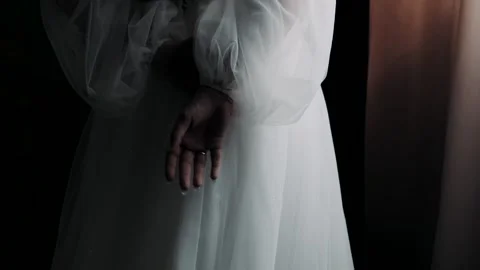 Woman's hands behind her back close-up Stock Footage 253621177