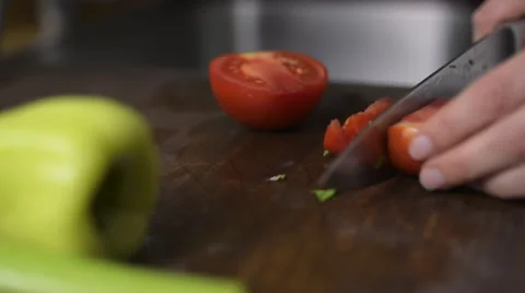 Woman's hands chopping tomatos Video stock 57238261