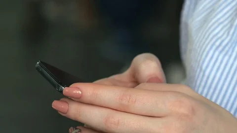 Woman's hands close up typing text on phone  Stock Footage 73938020