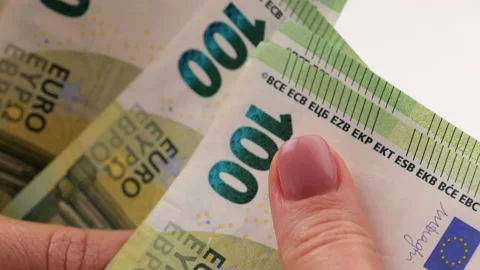 Woman's hands counting 100 euro banknotes or paying in cash on the background of 스톡 동영상 200216760