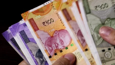 Woman's hands counting Indian currency notes (INR) Stock Footage 313219451