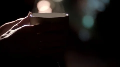 Woman's hands cup of tea coffee tilt up Video stock 69270448