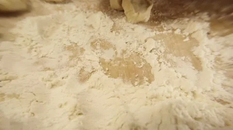 Woman`s Hands Dip in Flour Sliced Piece of Paste Super Close up Stock Footage 66441680
