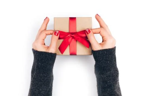 Woman's hands with gift box Stock Photos