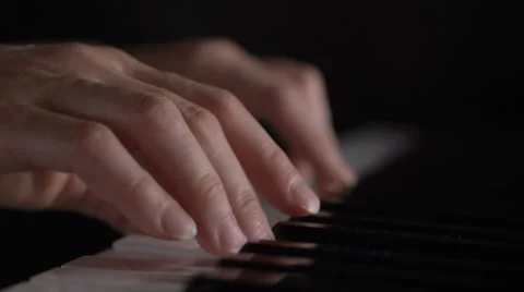 Woman's hands on the keyboard of the piano closeup Stock Footage 69008943
