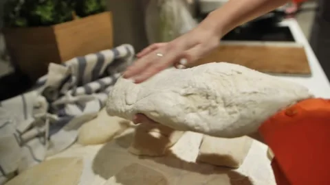 Woman's hands kneading dough for baking bread bakery Stock Footage 237702681