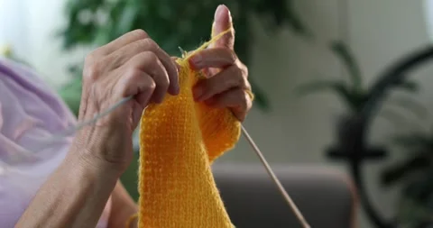 Woman's hands knitting Stock Footage 278149050