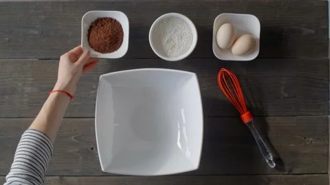 Woman's hands layout ingredients for cooking Stock Footage 147143833