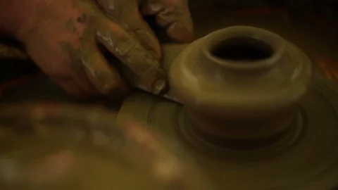 Woman's hands makes a pot on pottery wheel Stock Footage 71525497