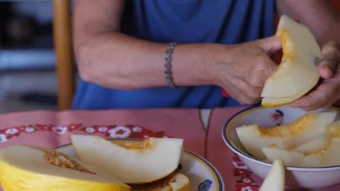 Woman's Hands Peeling White Melon Stock Footage 305853839
