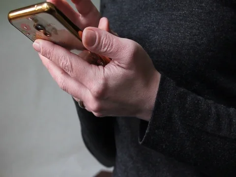 Woman's hands with phone Stock Footage 75611001