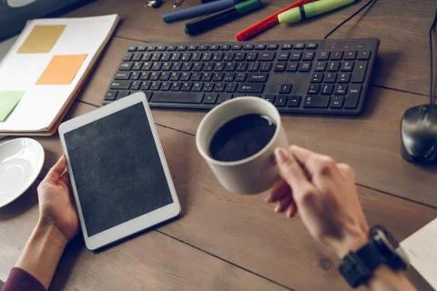 Woman's hands pointing finger, screen tablet, copy space for advertising Stock Photos