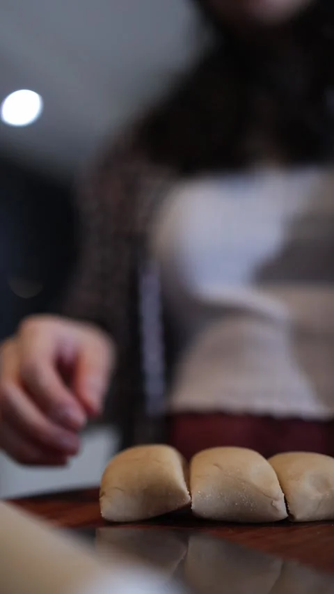 Woman's hands preparing homemade cookie dough for baking Stock Footage 346478460