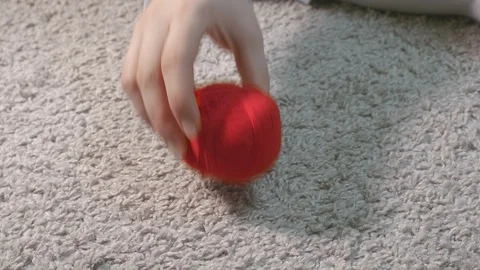 Woman's hands put balls of yarn in row. Starting new knitting project. Close up Stock Footage 129051630