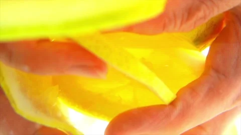 Woman's hands removing sliced lemon from water Stock Footage 197473431