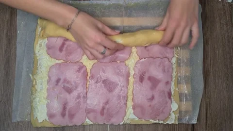 Woman's Hands Rolling Dough With Ham Slices. Ham Bread Roll Stock Footage 220727304