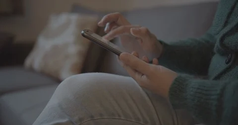 Woman's Hands Scrolling on Phone Stock Footage 124005649