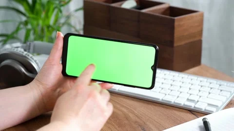 Womans hands scrolling smartphone screen Stock Footage 168264587