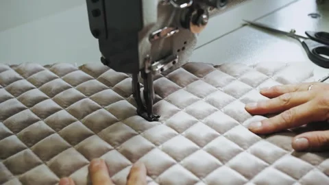 Woman's hands sewing fabric on the automatic sewing machine. Close-up seamstress Stock Footage 247080248