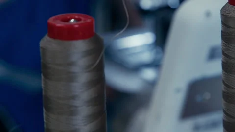 Woman's Hands Sewing Fabric On The Automatic Sewing Machine. Close-Up Seamstress Stock Footage 254373199