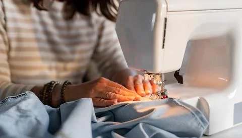 WomanS Hands Sewing On Machine Stock Photos