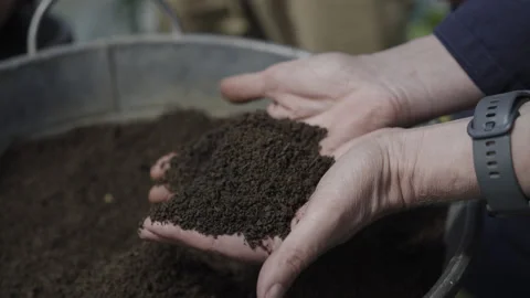 Woman's Hands in Soil Slow Motion 스톡 동영상 266914571