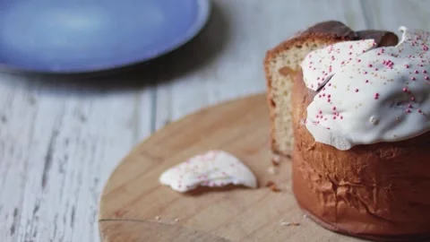 Woman's hands take one piece of Easter cake instead of two pieces. Stock Footage 300455415