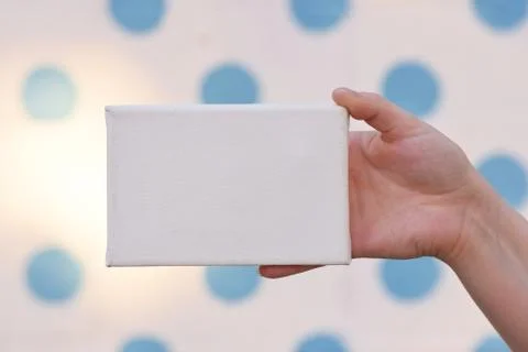 Woman's Hands with Tiny Canvas Stock Photos