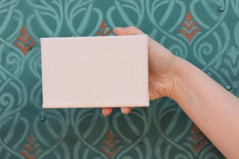 Woman's Hands with Tiny Canvas Stock Photos